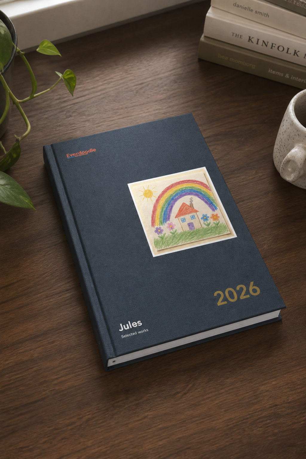 Design mockup of a Midnight Foil A4 hardcover lying on a wooden table